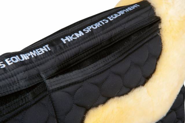 Tapis de selle HKM en mouton véritable