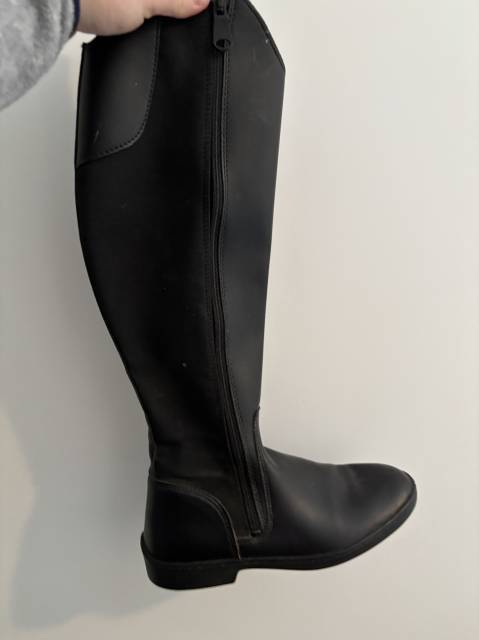 Bottes noires Décathlon très bon état 