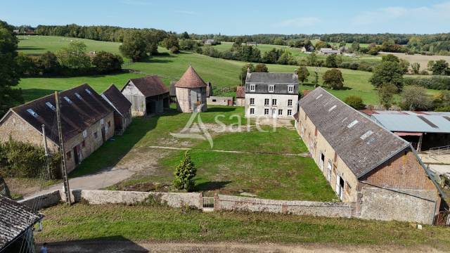 Ancien corps de ferme avec 21 ha