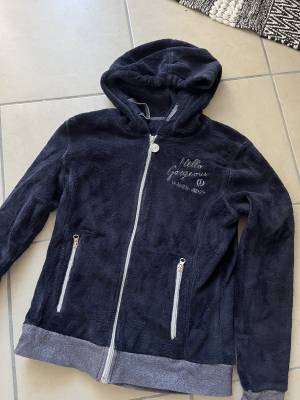 Veste polaire paillettes 
