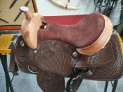 Silla de montar tejana de cuero y ante